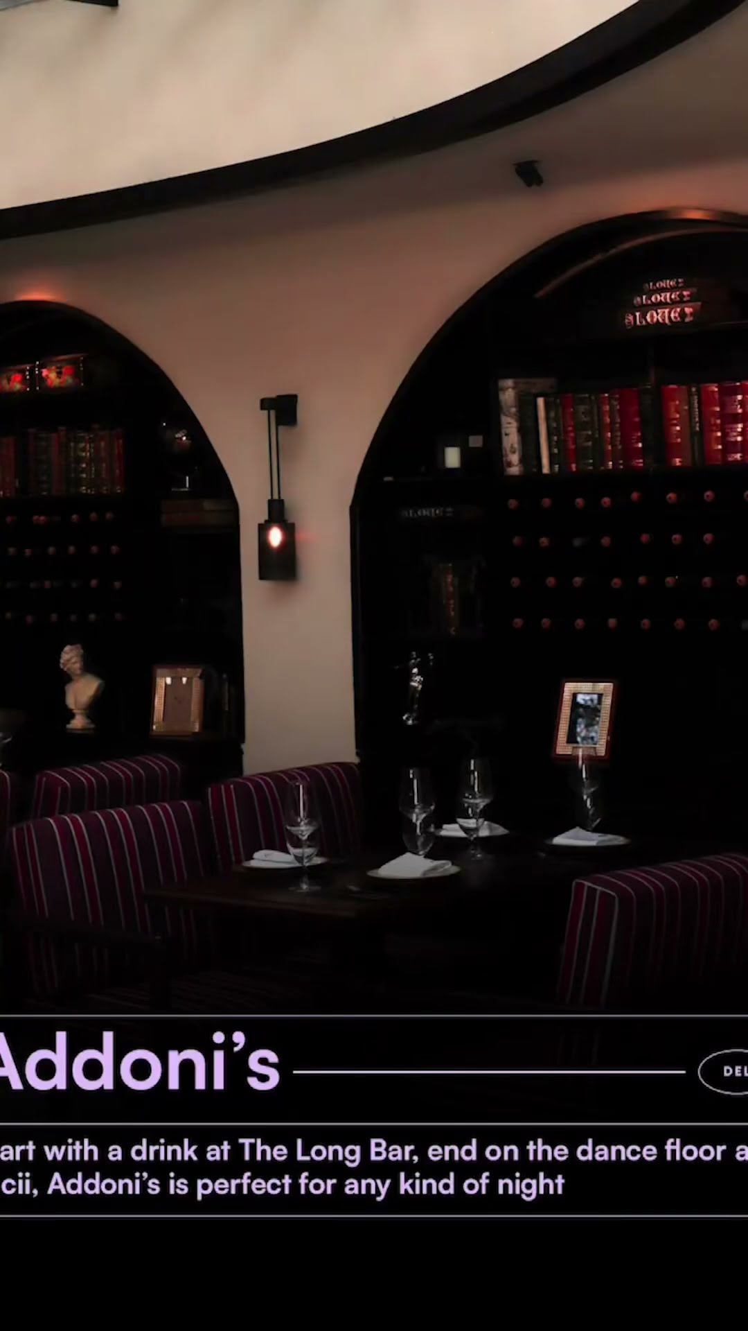 The arched bar room at Addoni's lit for the evening