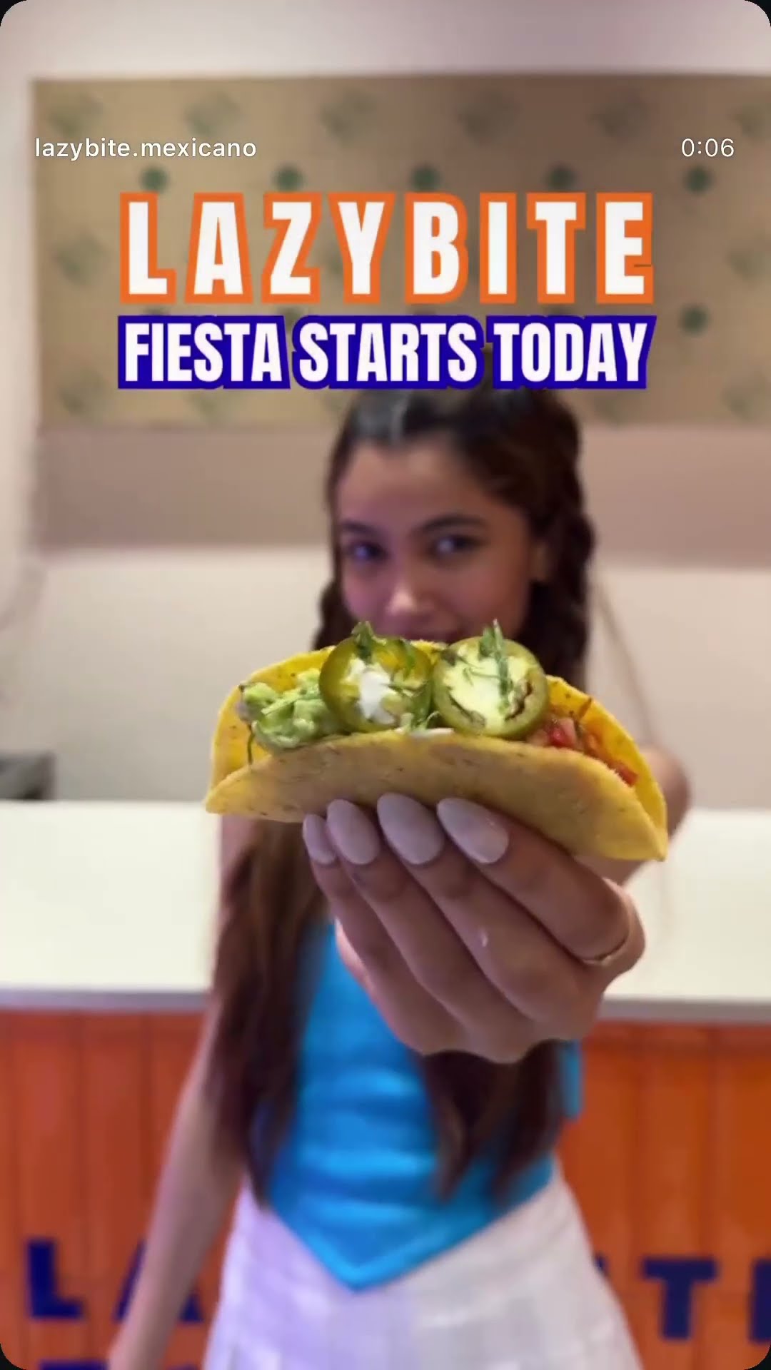 A creator holding a loaded taco, captioned Lazybite fiesta starts today