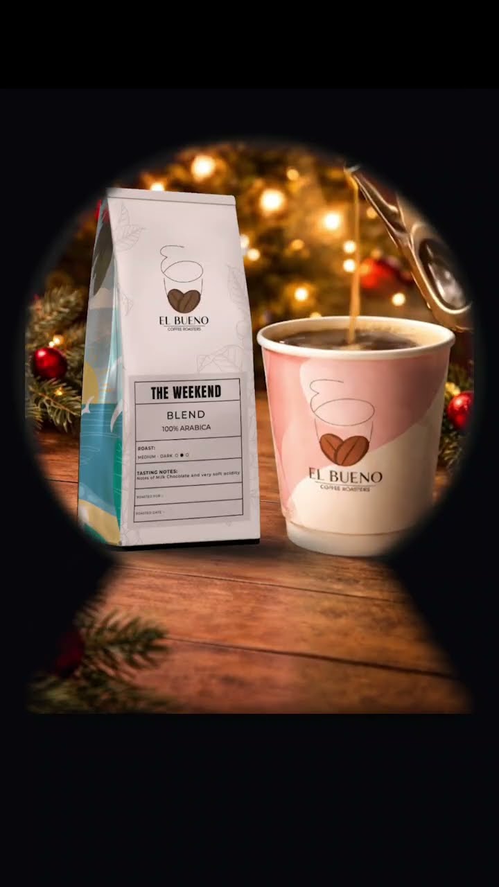 El Bueno Weekend Blend coffee pack beside a takeaway cup under festive lights